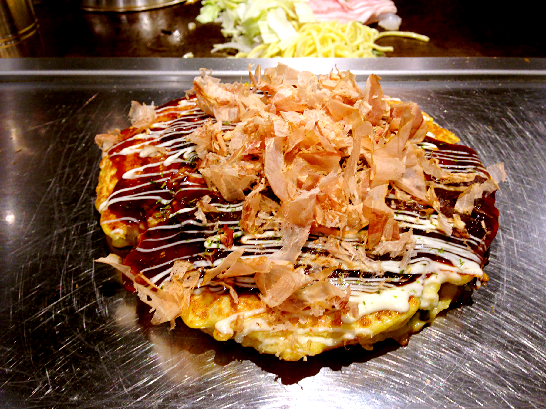 Okonomiyaki on a plate in Osaka