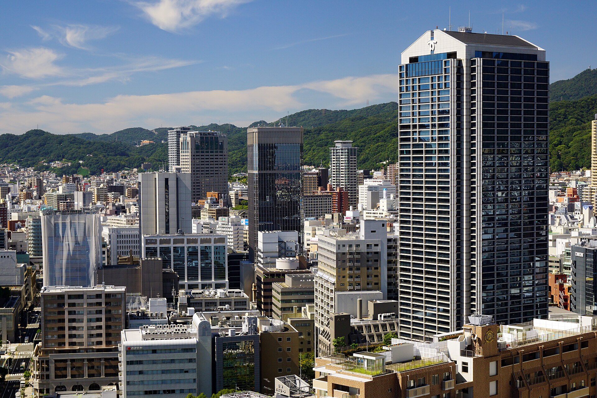 Sannomiya cityscape with Kobe's mountains behind it