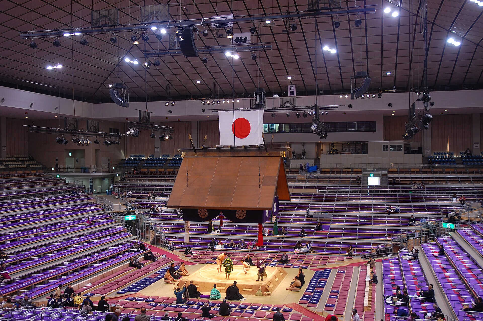 Sumo wrestlers competing inside Fukuoka Kokusai Center
