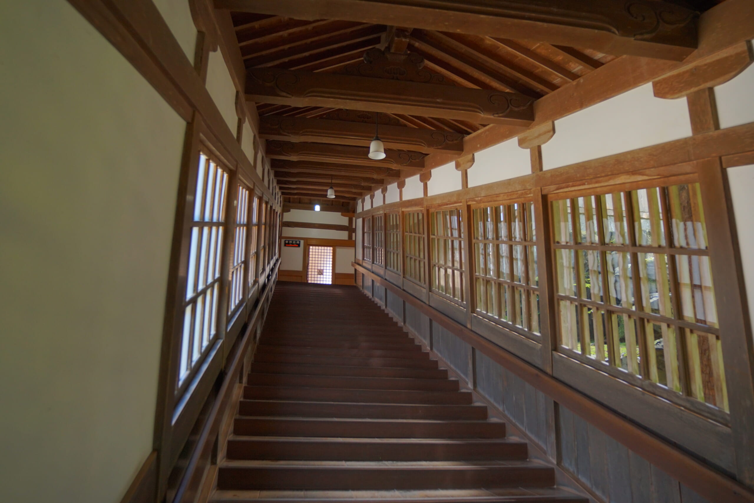 Long covered wooden stairs inside Eiheiji Temple